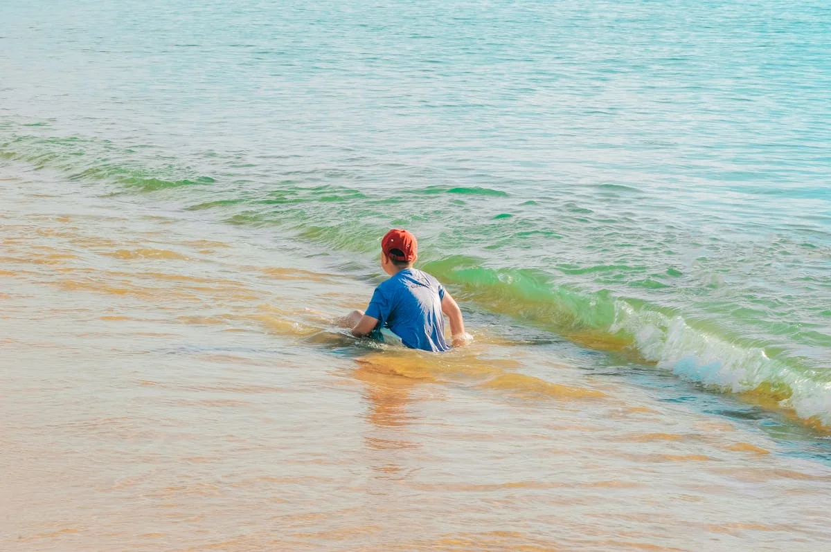 toddler routine on holiday — happy family travelling with toddler