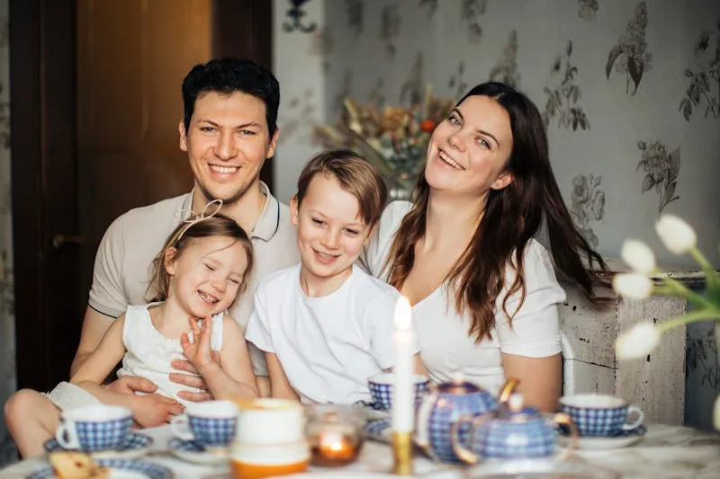 working mom toddler jealousy — mom with toddler and new baby