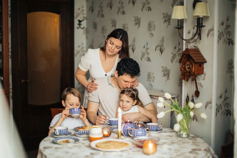 toddler jealousy strategies — toddler helping with younger sibling